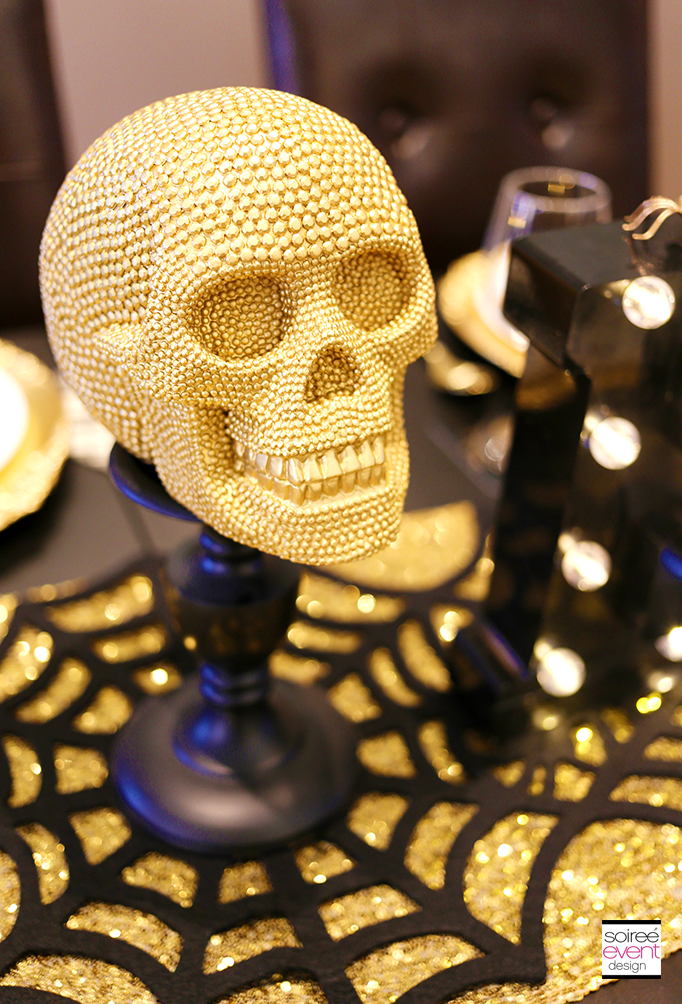 Gold skull candlestick